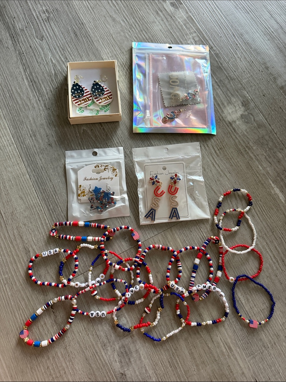 Set of 18 bracelets and four earrings